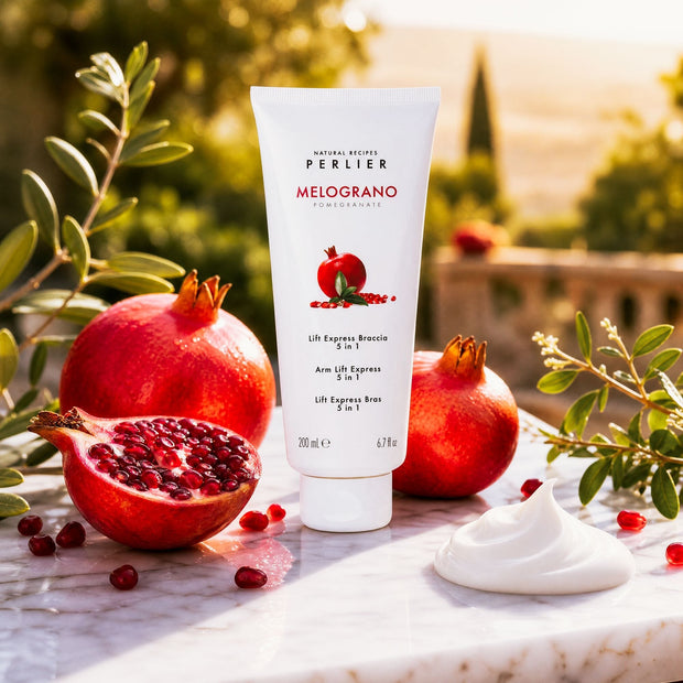 Perlier 6.7 oz tube of arm lift express on marble table with pomegranates