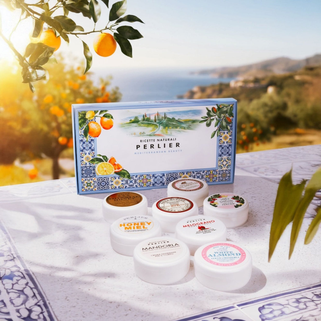 8 1.6 oz Perlier body cream jars with a scenic Italian background