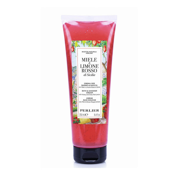 An 8.4 oz squeeze tube of Perlier Honey Red Lemon body wash on a white background