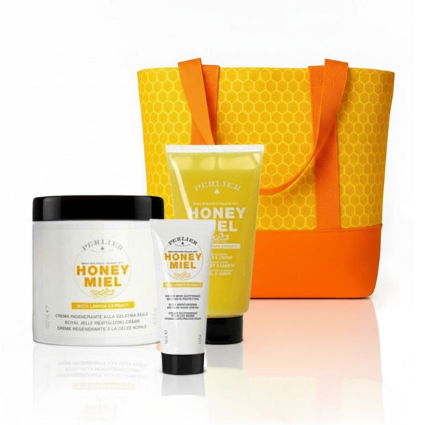 3 Perlier Honey Lemon body care products with a honeycomb-patterned bag on a white background