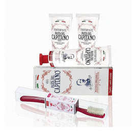 3 tubes of Pasta del Capitano Original Recipe toothpaste and toothbrush on a white background