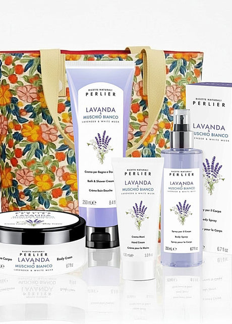 4 Perlier Lavender & White Musk bodycare products and a floral tote bag, on a white background