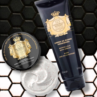 Imperial Honey body wash and cream with a hexagonal pattern background