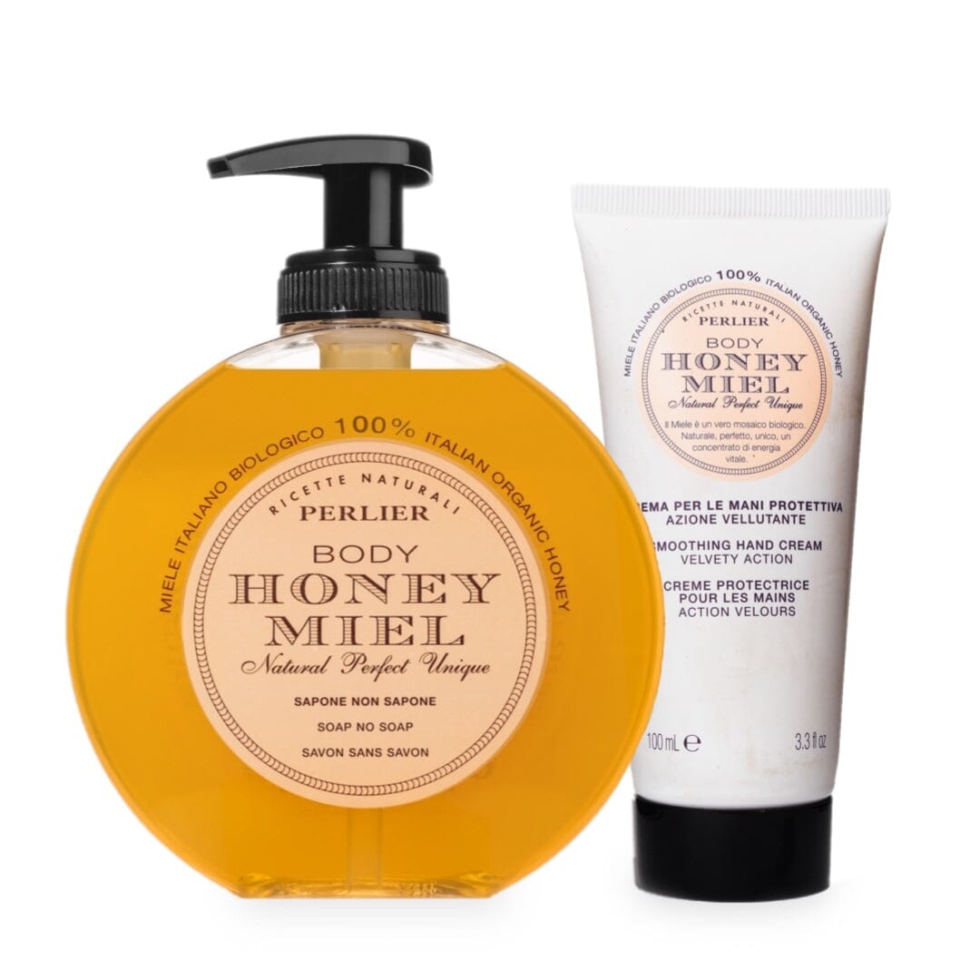 PERLIER HONEY MIEL HAND CARE DUO | PICTURED:  10.1 OZ HONEY MIEL LIQUID SOAP IN CLEAR ROUND BOTTLE WITH BLACK PUMP TOP AND 3.3 OZ HONEY MIEL SMOOTHING HAND CREAM IN WHITE TUBE WITH BLACK SCREW-TOP CAP